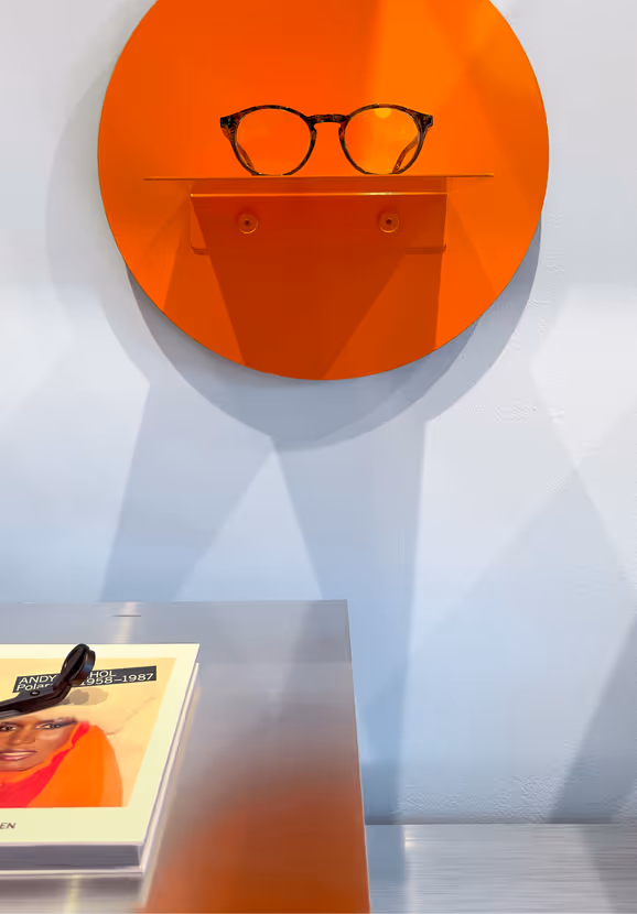 Opticians - Glasses on red circle shelf