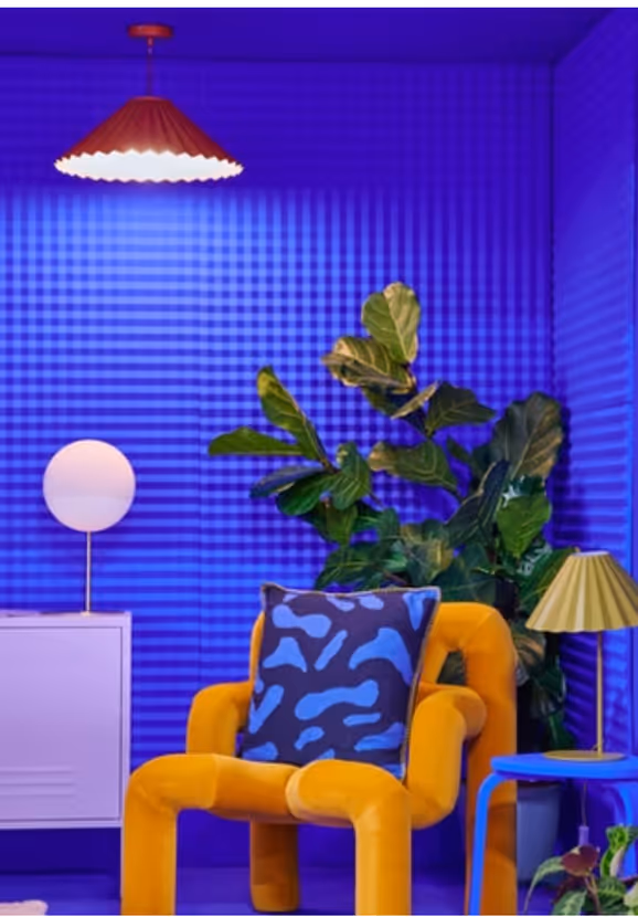 blue wall with orange chair