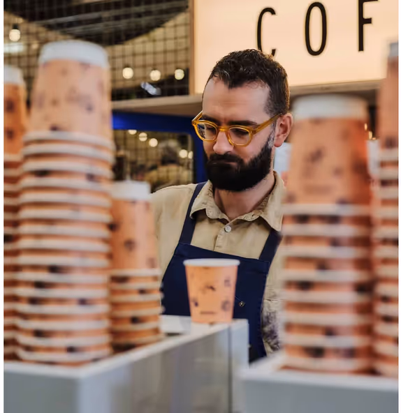 Man with coffee cups